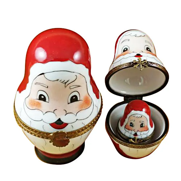 Four Nesting Santa Claus Limoges Box