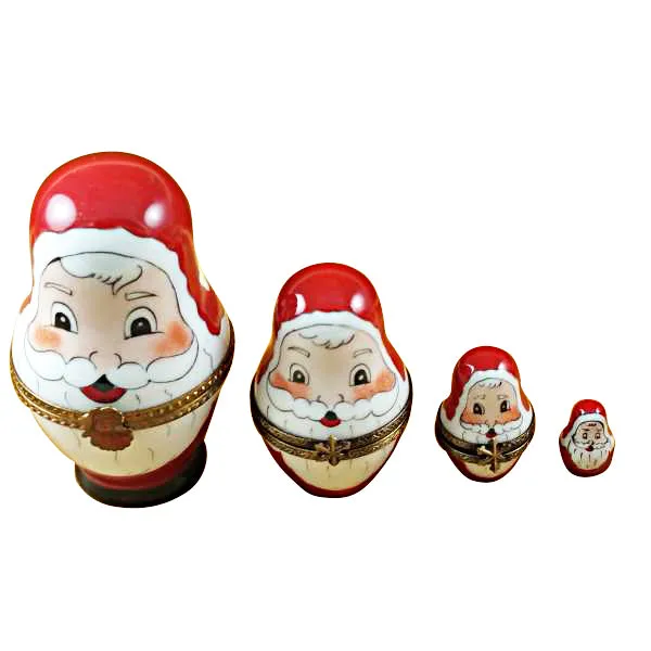 Four Nesting Santa Claus Limoges Box