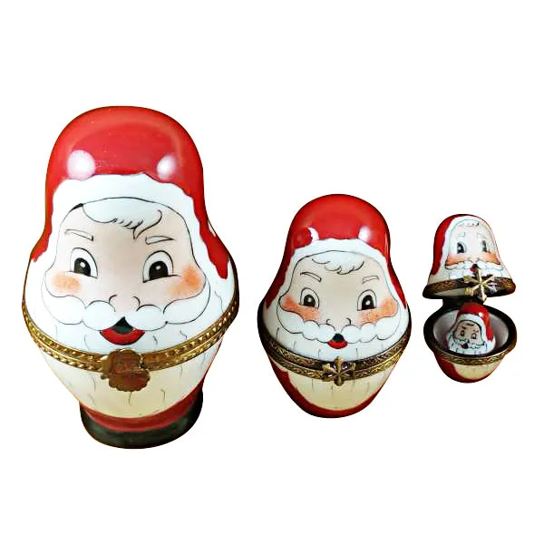 Four Nesting Santa Claus Limoges Box